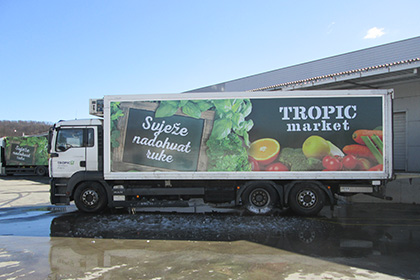 Image displaying tarpaulin on truck trailer